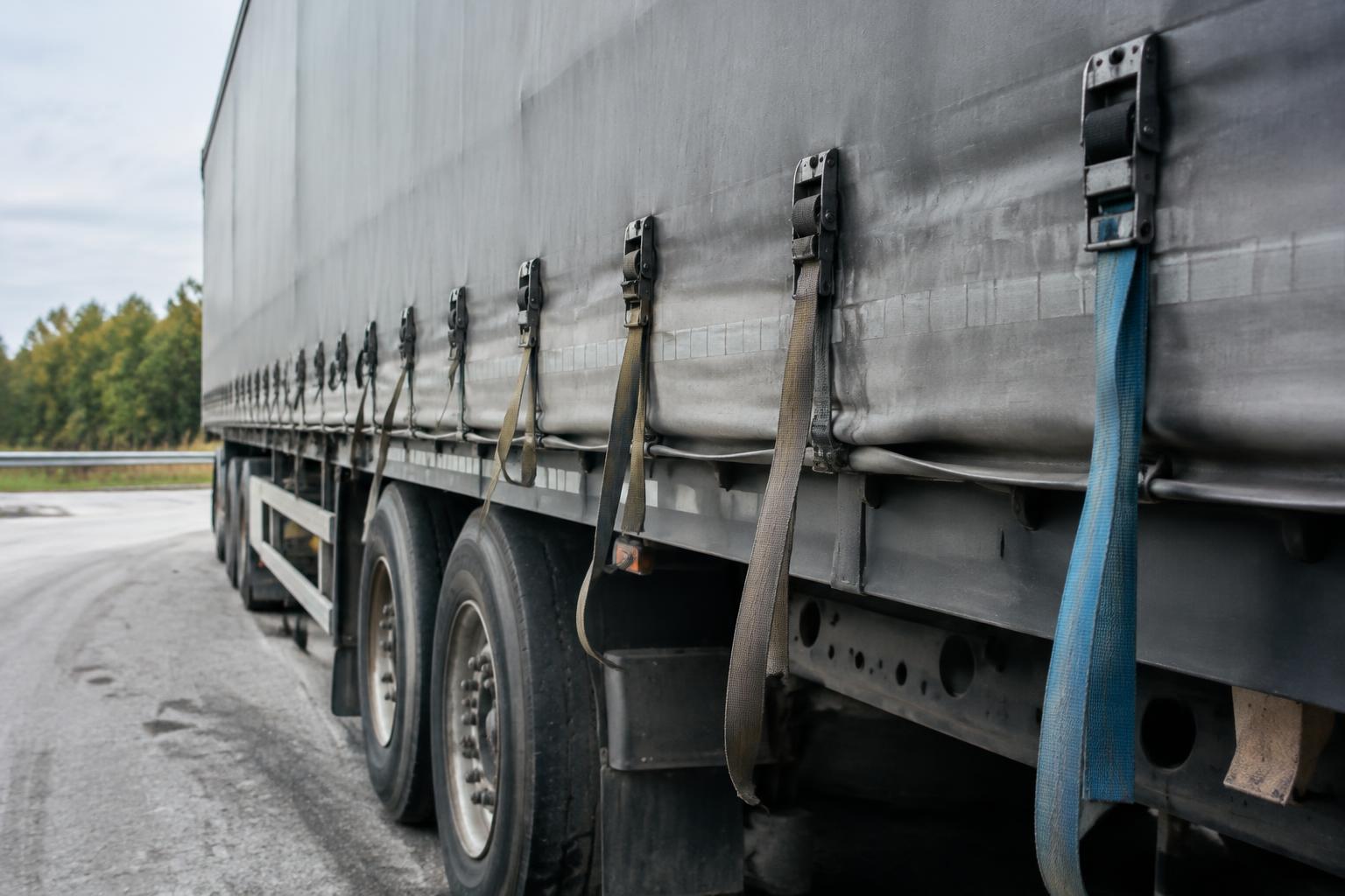 Roadside inspection of cargo and trailer following a truck accident investigation